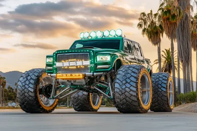 Custom Green Monster Truck Parked Outdoors