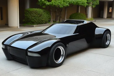 Futuristic Black Concept Sports Car Parked Outdoors