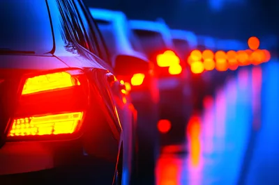 Traffic Jam With Glowing Red Tail Lights At Night