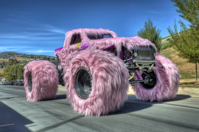 Pink Furry Monster Truck On City Street