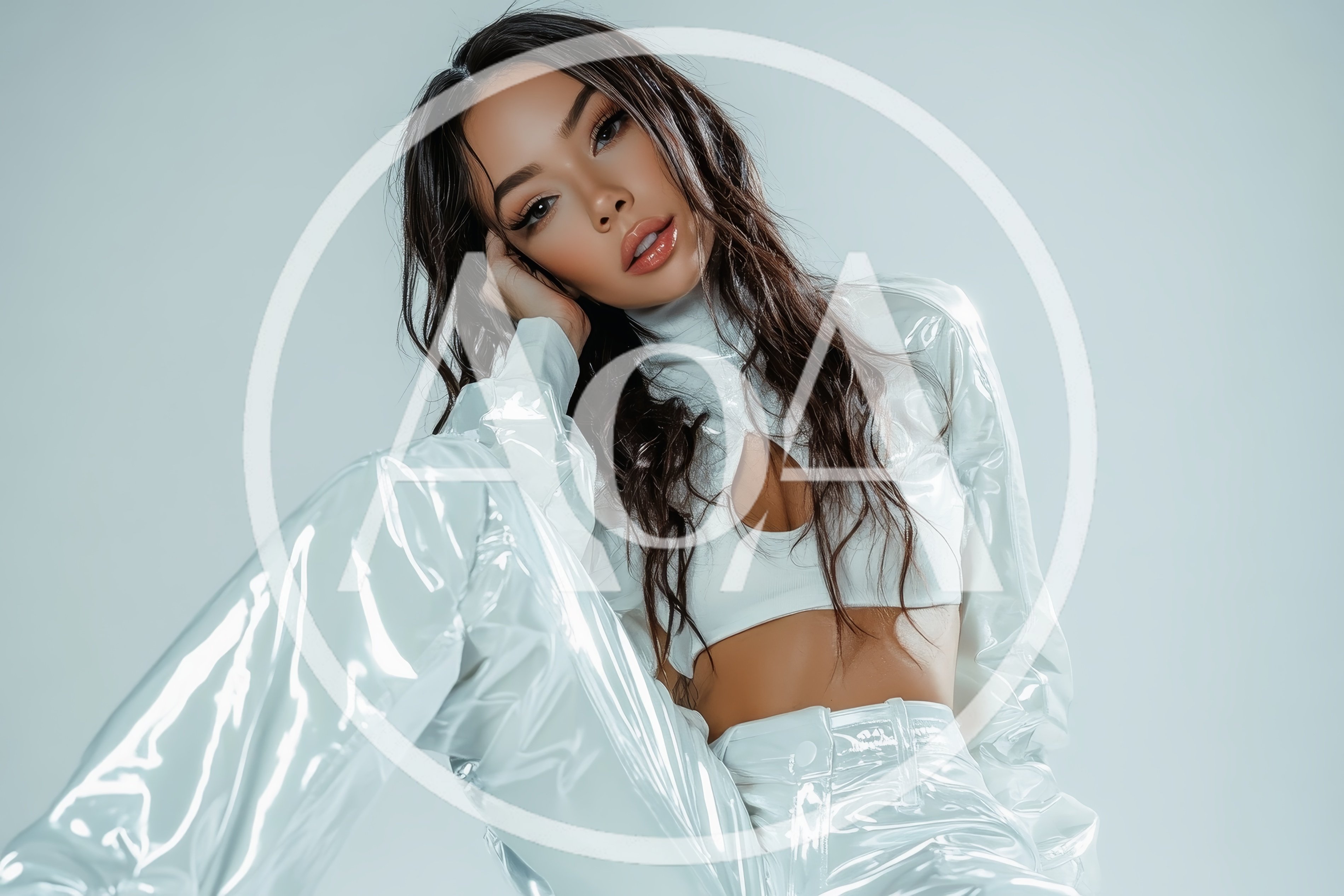 Fashion Model Posing In Shiny White Vinyl Outfit