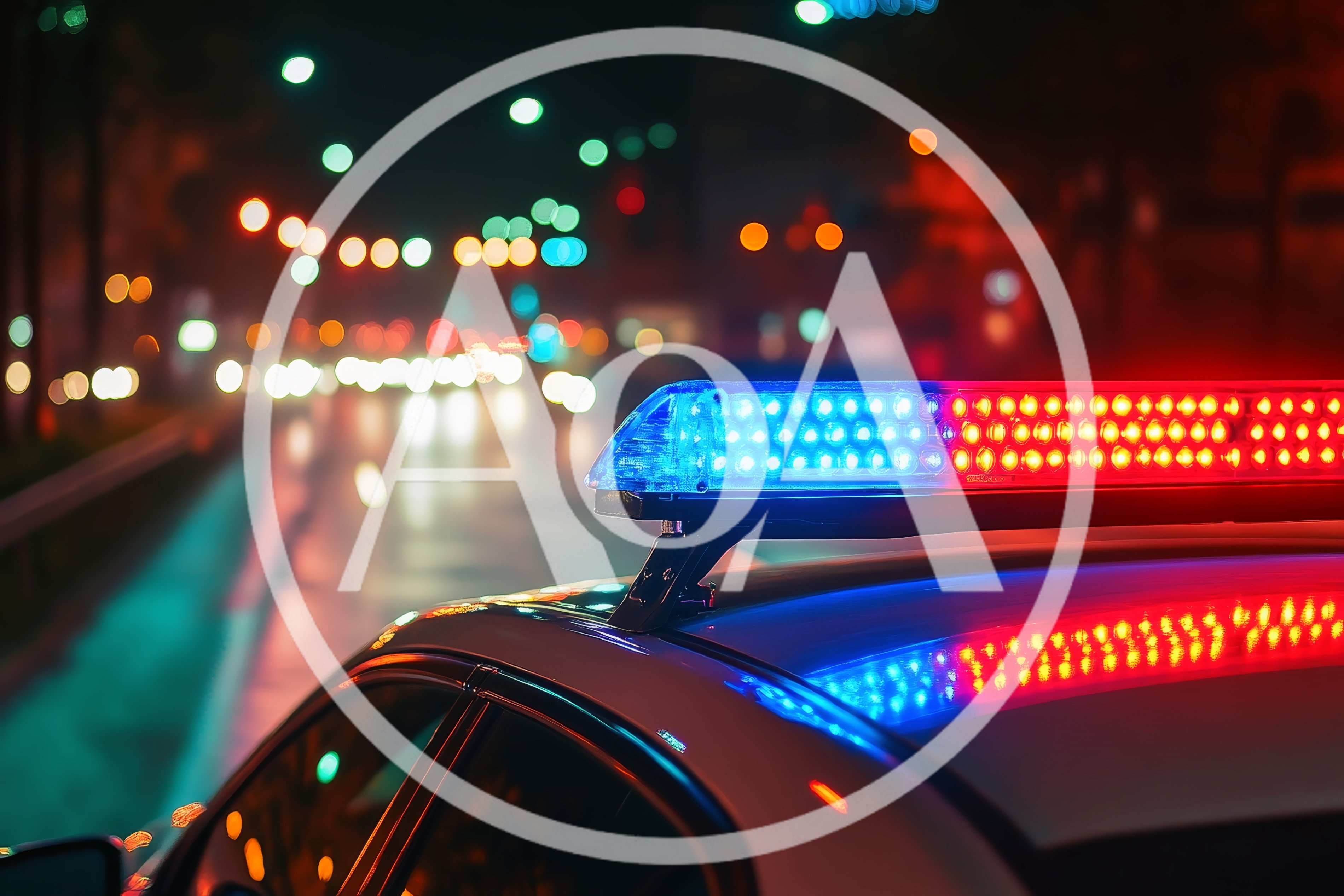 Police Car Emergency Lights Flashing At Night