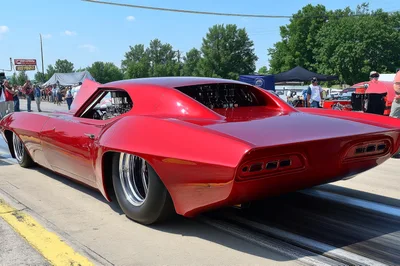 Custom Red Pro Mod Drag Car at Racetrack