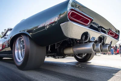 Rear View Of A Drag Racing Muscle Car