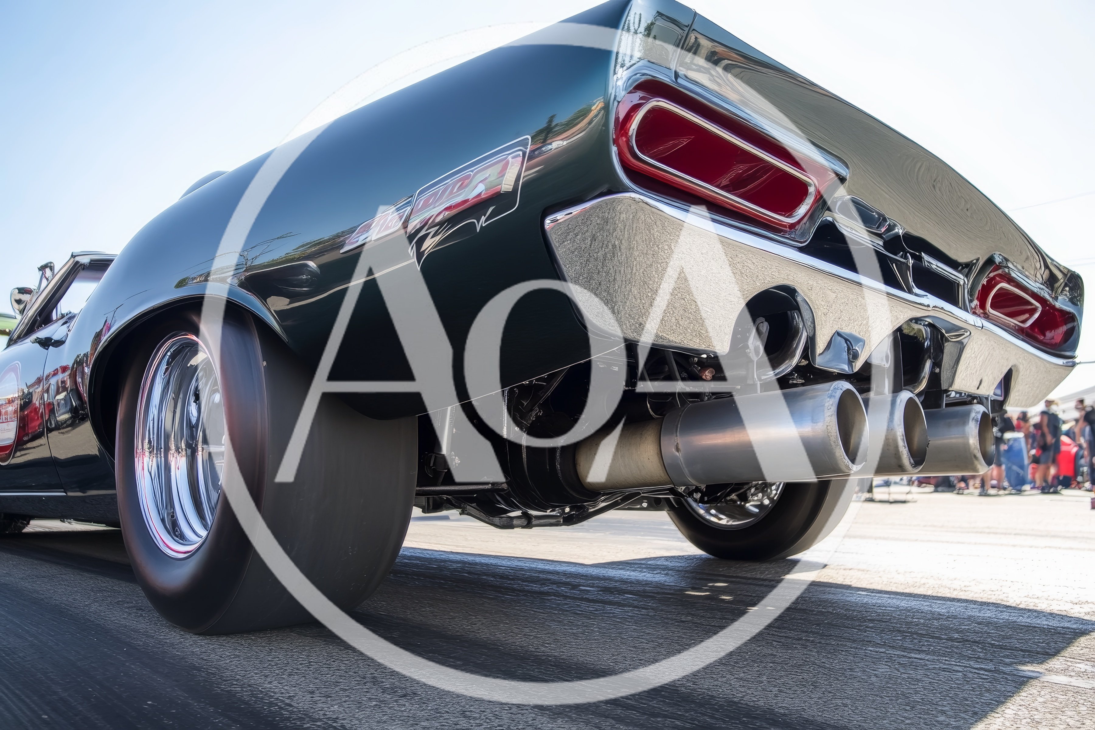 Rear View Of A Drag Racing Muscle Car