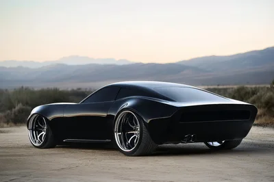 Custom Black Sports Car Parked In Desert Landscape