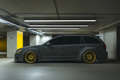 Modified Grey Station Wagon Parked In Underground Garage