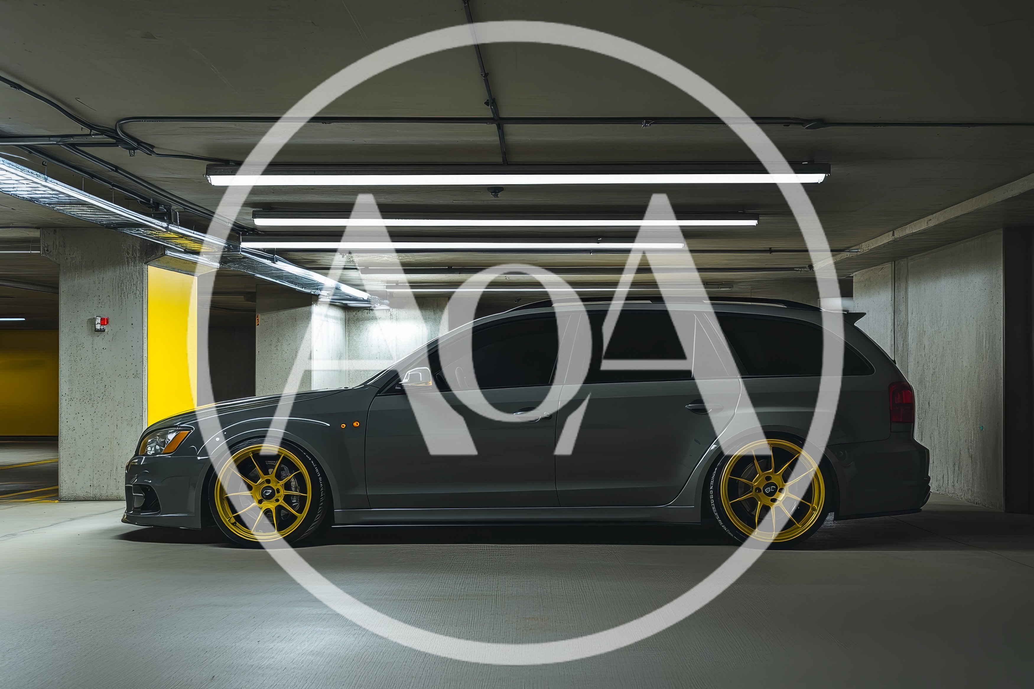 Modified Grey Station Wagon Parked In Underground Garage