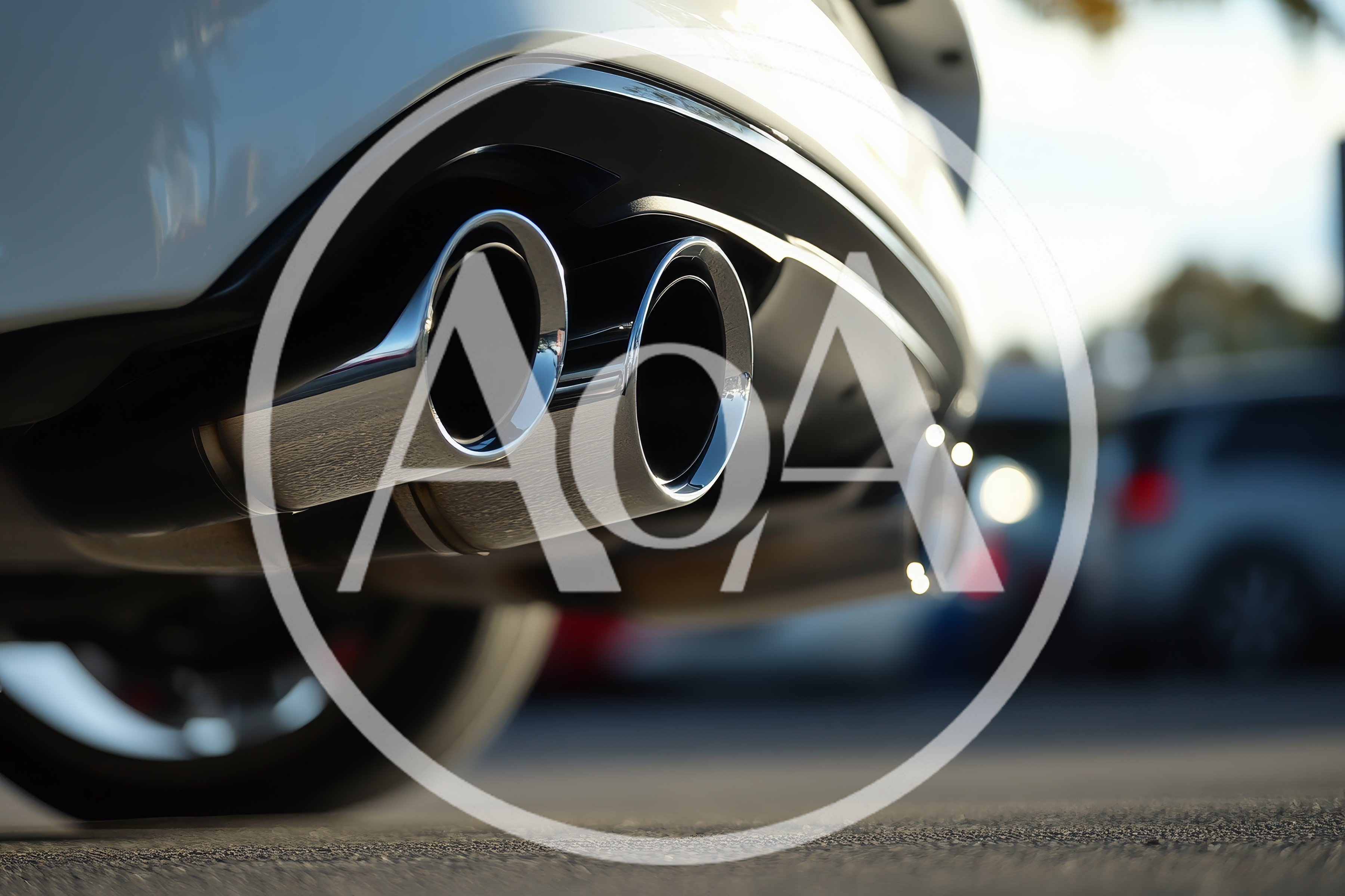Close Up Of Chrome Dual Exhaust Pipes On Car