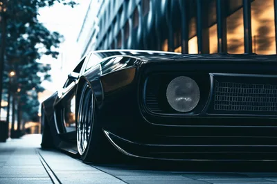 Custom Black Muscle Car Parked On City Street