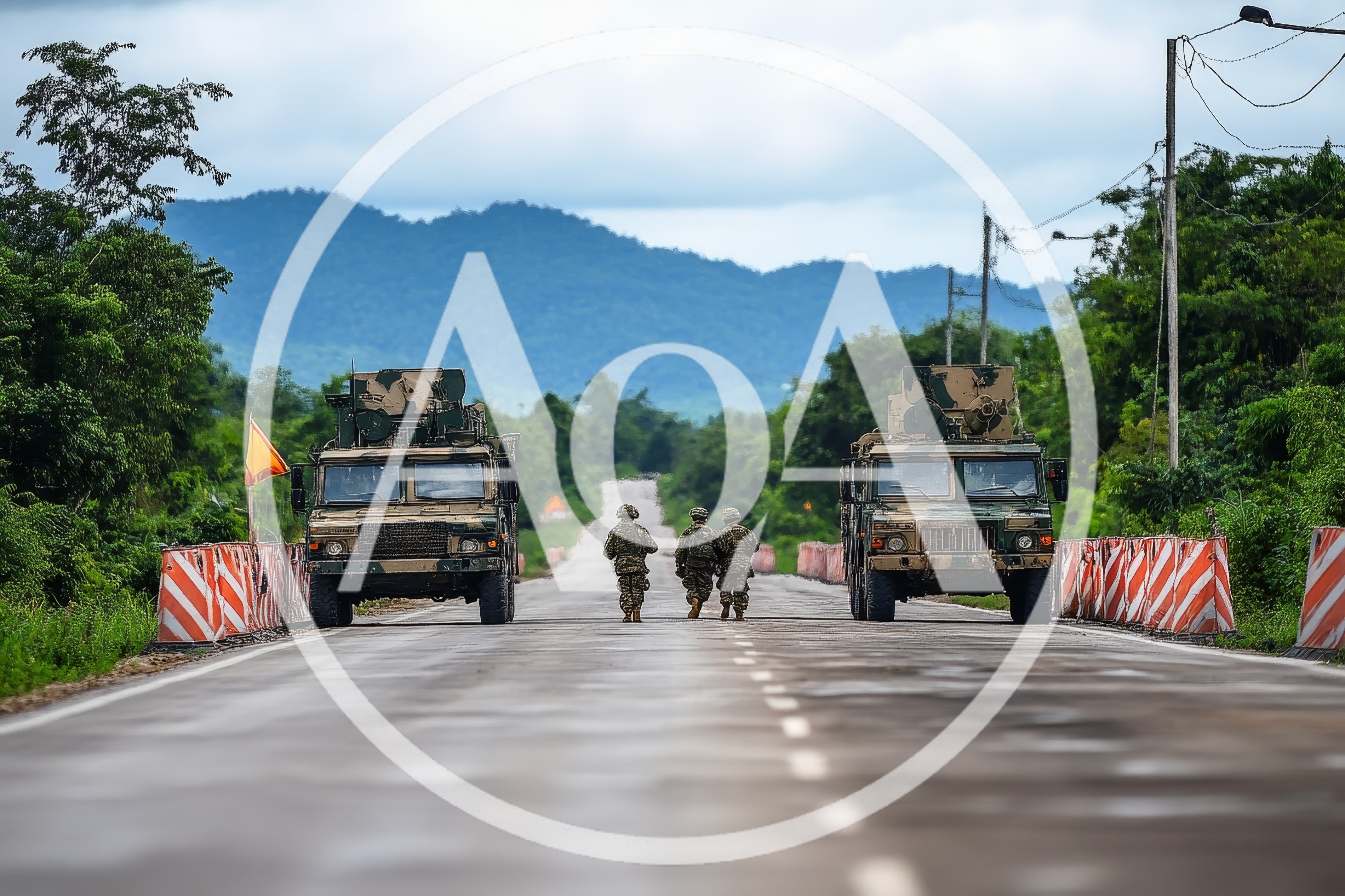 Military Soldiers Walking Between Two Tactical Trucks