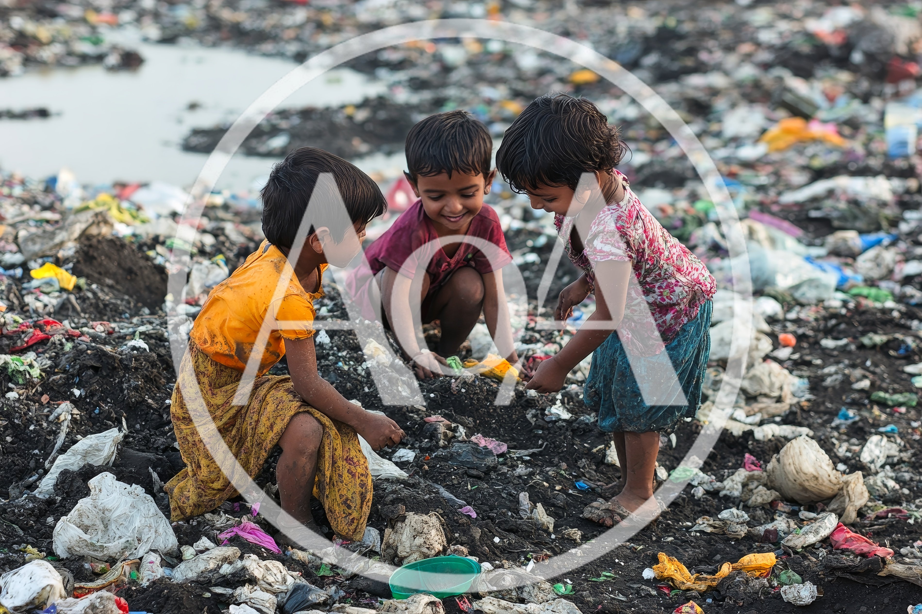 Three Children Playing Amidst Trash in a Landfill