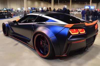 Custom Matte Blue And Orange Sports Car At Auto Show