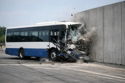 Bus Crashing Into A Concrete Wall