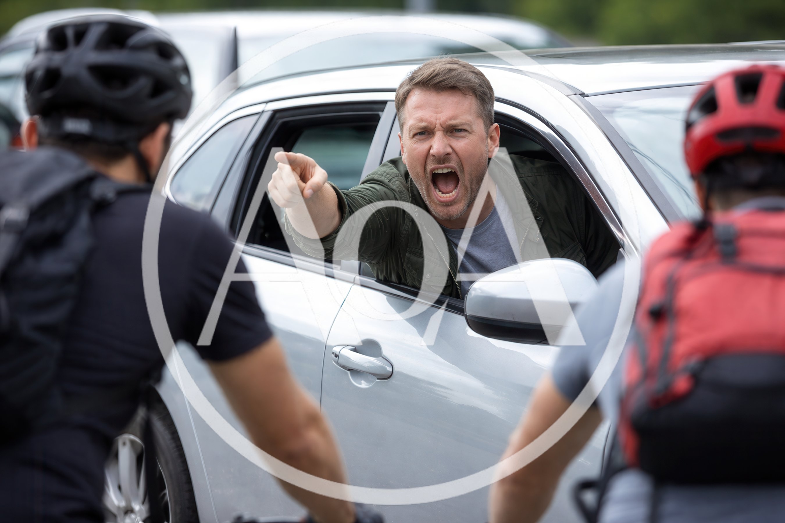 Angry Driver Confronting Cyclists on Road