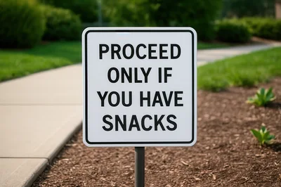 Humorous Sign Warning Pedestrians To Carry Snacks