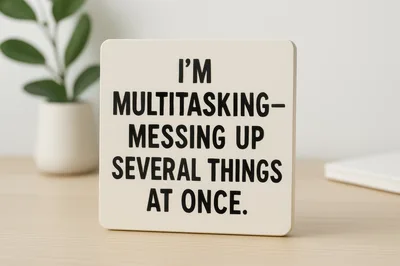Humorous Multitasking Sign on Office Desk