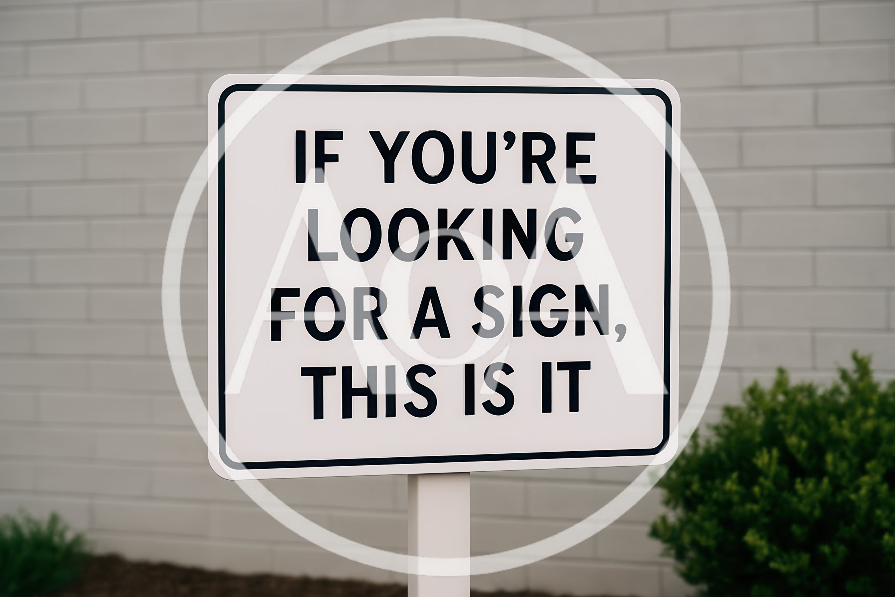 Signage With Humorous Text Against A Brick Wall