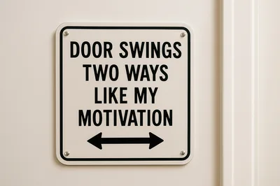 Humorous Sign About Motivation On A Wall