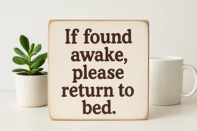 Wooden Sign With Humorous Text About Sleeping