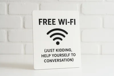 Humorous Free Wi-Fi Sign On White Brick Background