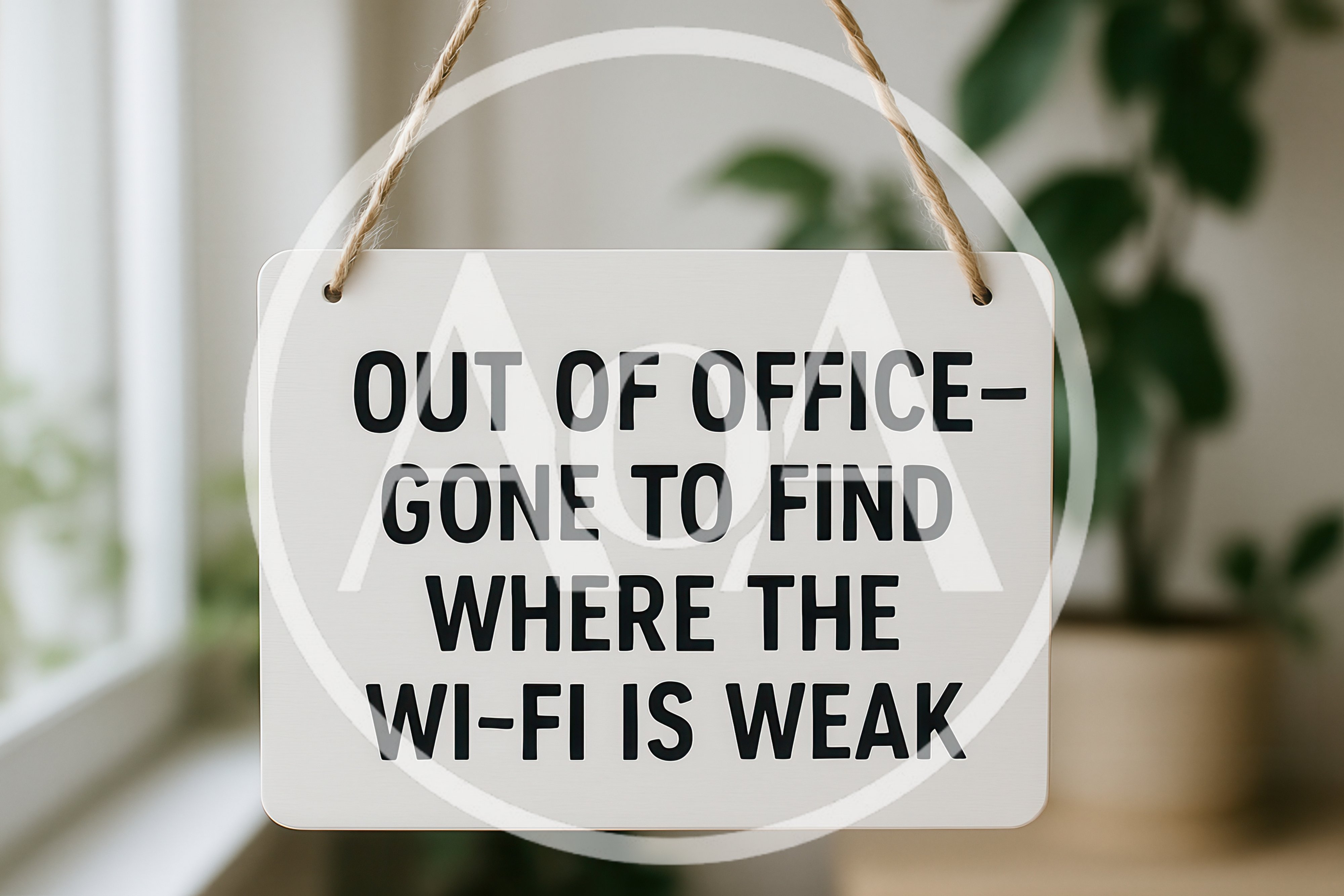 Out Of Office Sign Hanging In A Bright Office