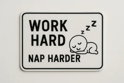 Work Hard Nap Harder Sign on White Wall