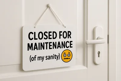 Closed For Maintenance Sign Hanging On A White Door