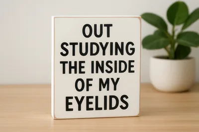 Wooden Sign With Humorous Text About Sleeping