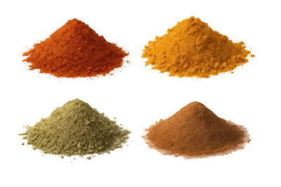 Four Piles Of Colorful Ground Spices On White Background