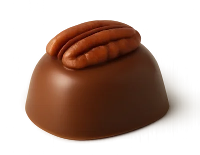 Single Chocolate Truffle Topped With A Pecan Nut