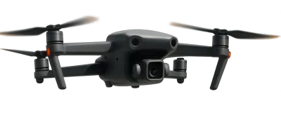 Black Quadcopter Drone Hovering In Mid Air