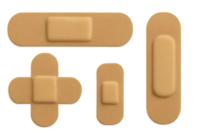 Assorted Adhesive Bandages On White Background
