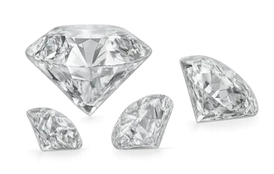 Four Brilliant Cut Diamonds On White Background