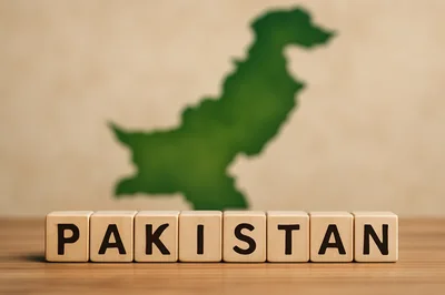 Wooden Blocks Spelling Pakistan With Country Map Background