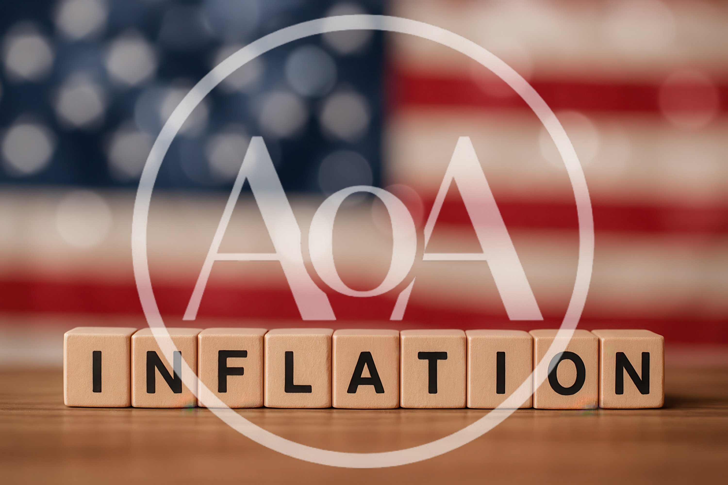 Wooden Blocks Spelling Inflation Against American Flag Background