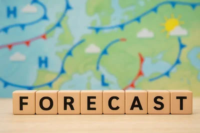 Wooden Blocks Spelling Forecast Against Weather Map Background