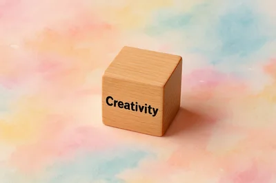 Wooden Block With The Word Creativity On Pastel Background