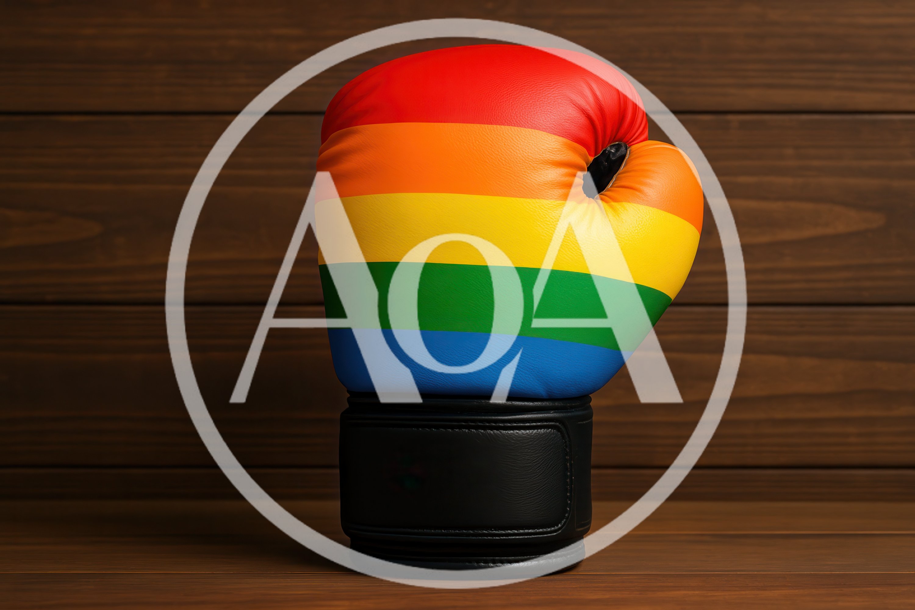 Rainbow Pride Boxing Glove on Wooden Background