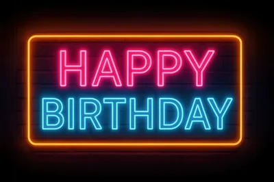 Neon Happy Birthday Sign On Brick Wall
