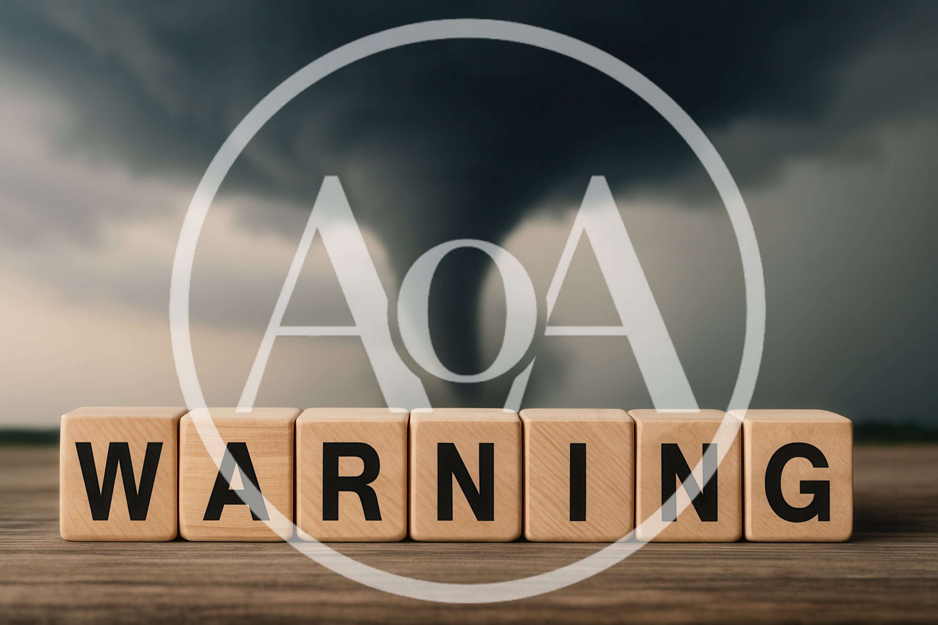 Wooden Blocks Spelling Warning With A Tornado Background