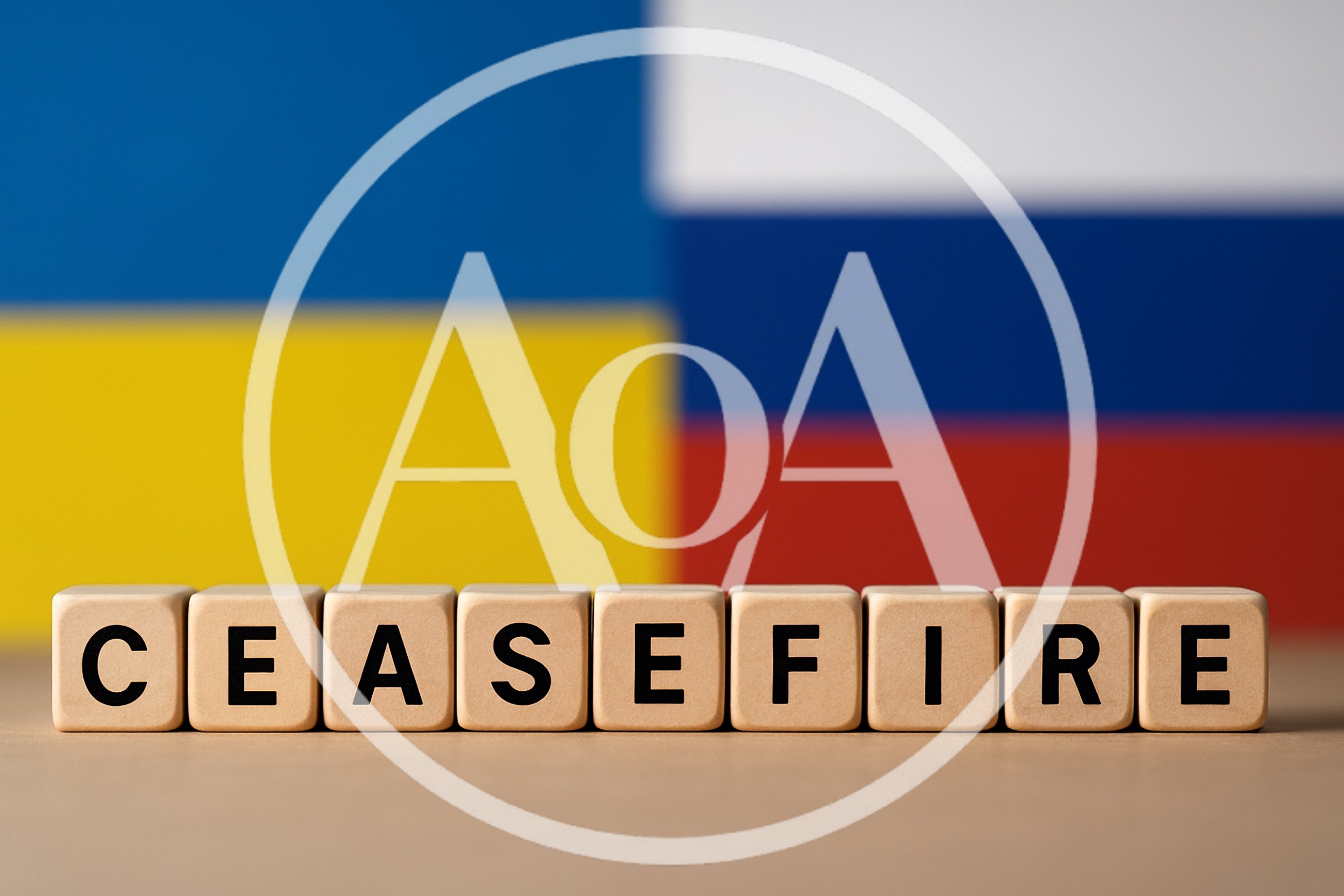 Wooden Blocks Spelling Ceasefire Against Ukrainian and Russian Flags