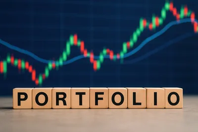 Wooden Blocks Spelling Portfolio Against Financial Stock Market Chart