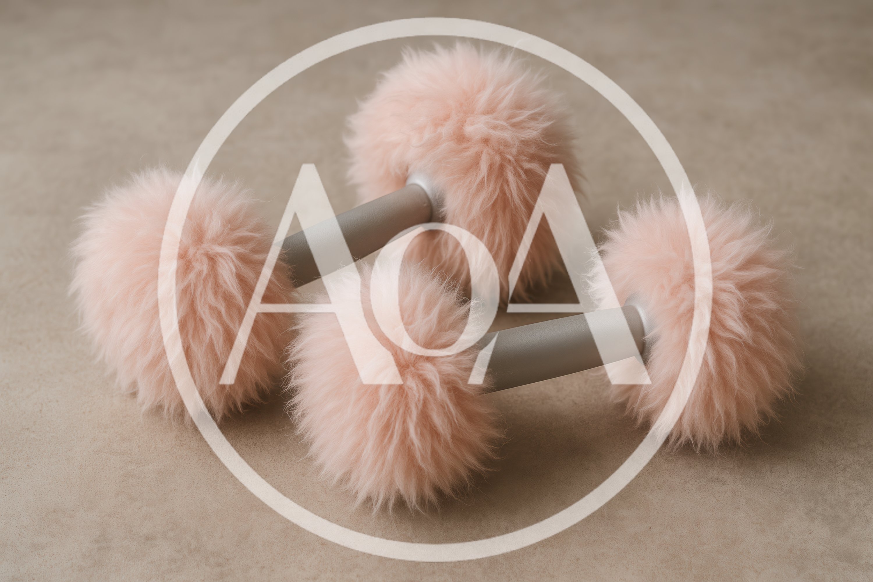Two Fluffy Pink Dumbbells on a Neutral Surface