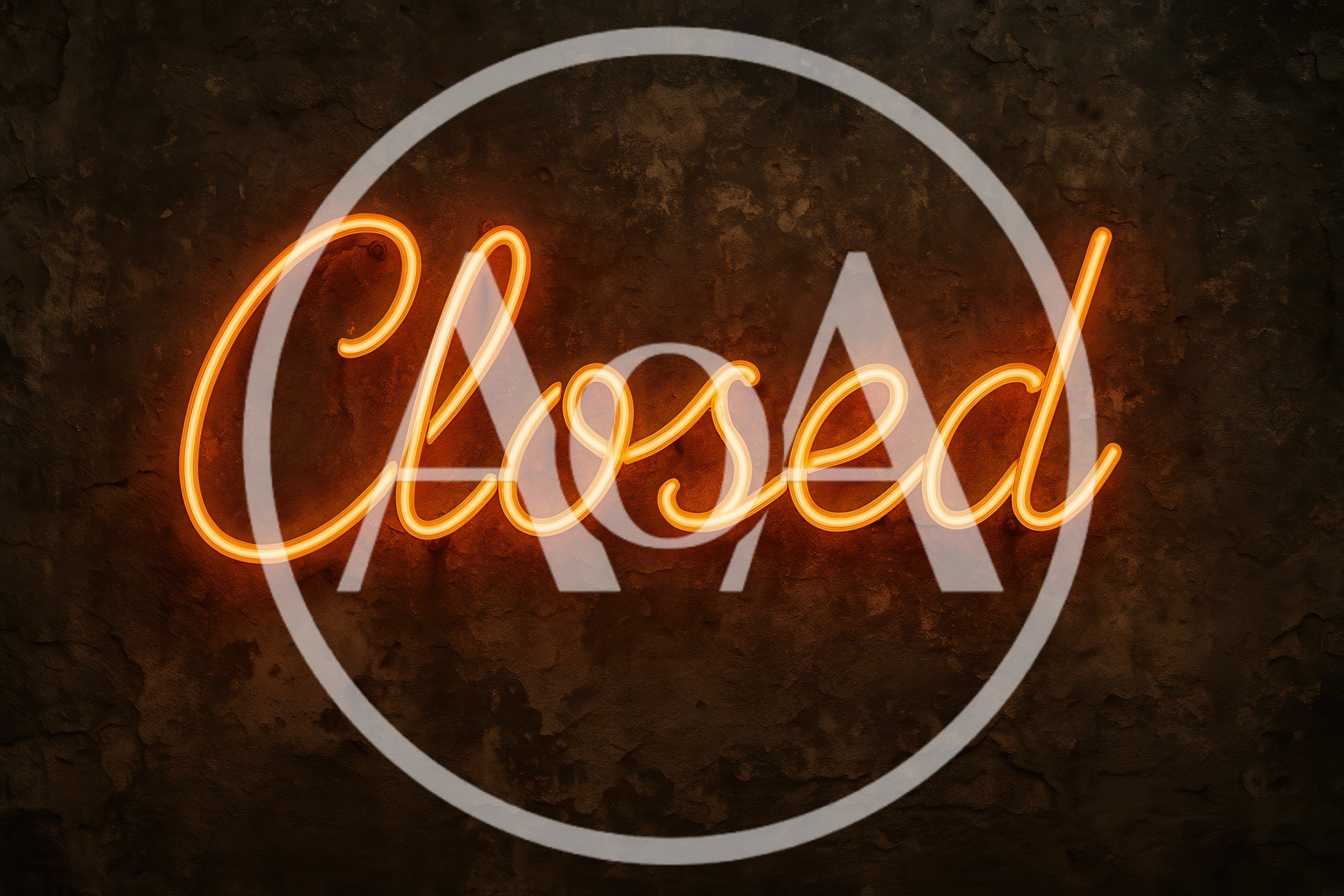 Glowing Orange Neon Closed Sign On Dark Textured Wall