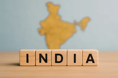 Wooden Blocks Spelling India With Map Background