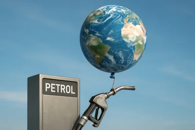 Earth Globe Balloon Attached To A Petrol Pump Nozzle