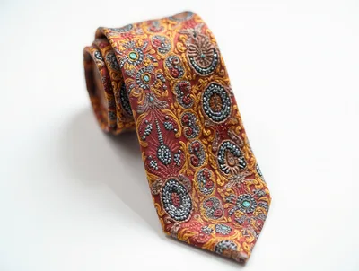 Rolled Red And Gold Paisley Pattern Necktie
