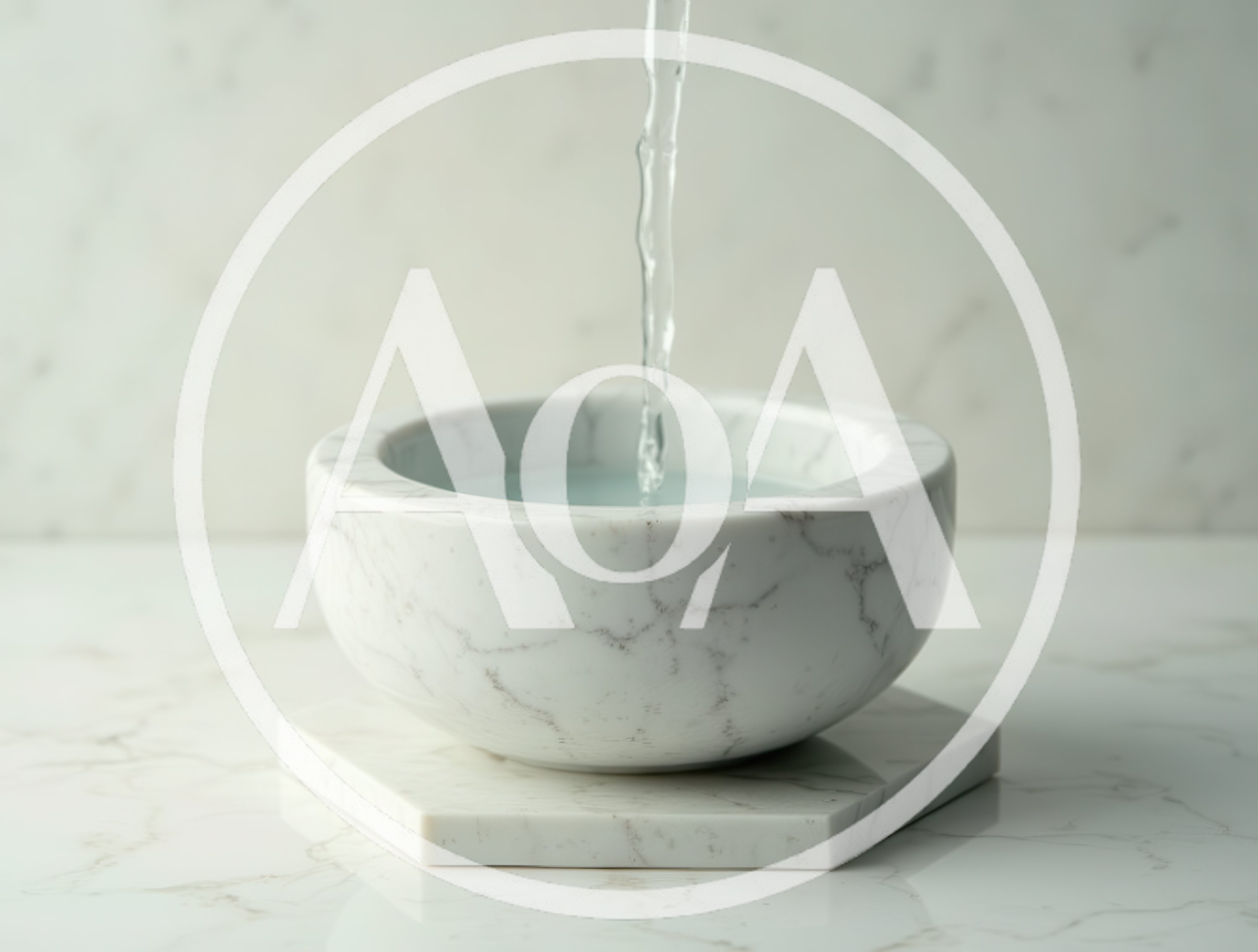 Water Pouring Into A Marble Bowl