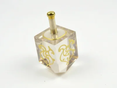 Clear Acrylic Dreidel With Gold Hebrew Lettering